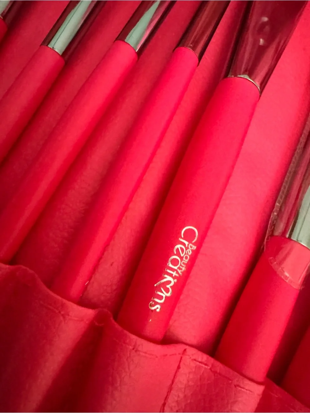 Hot pink Beauty creations makeup brushes